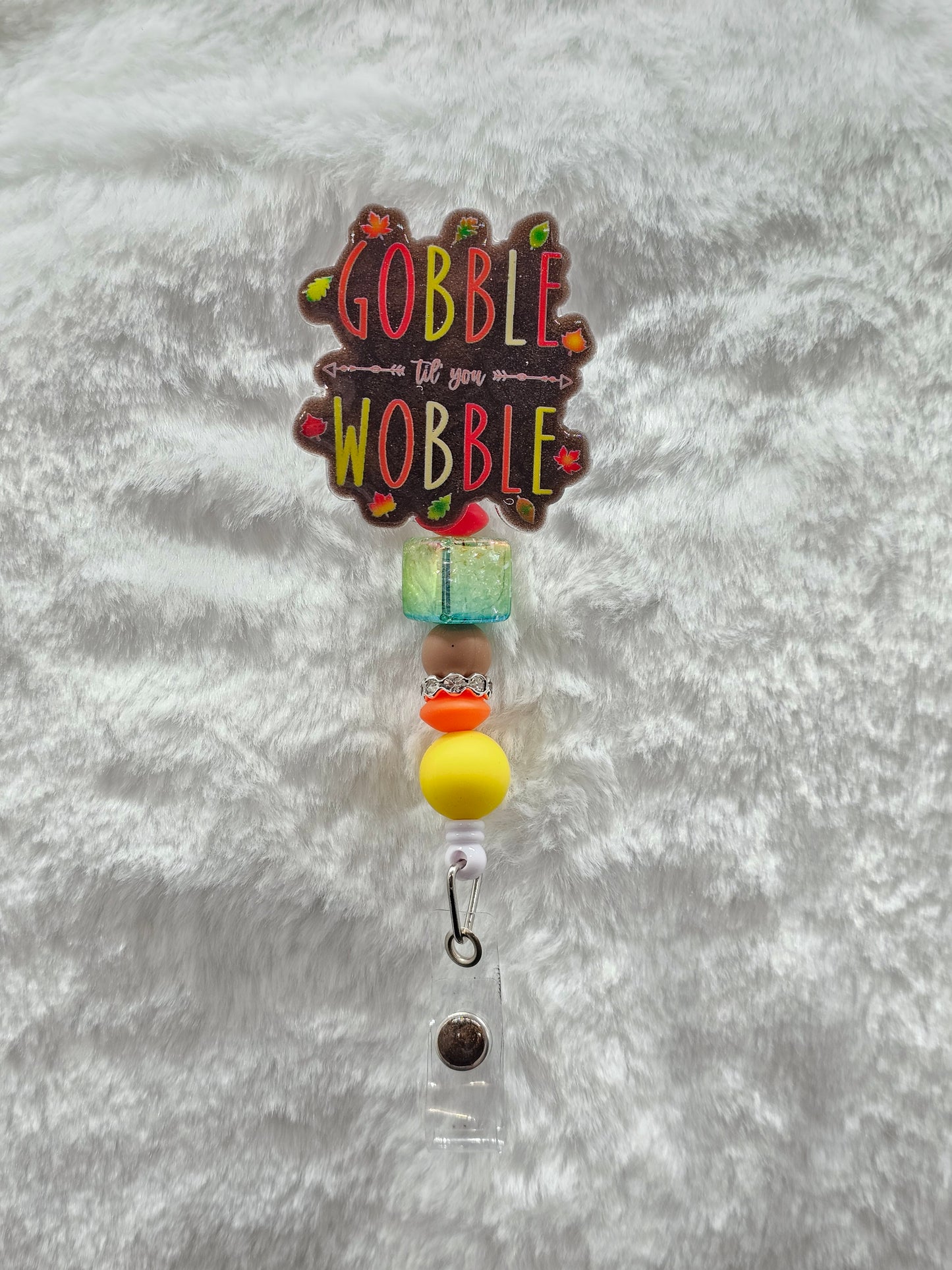 Gobble Til You Wobble Badge Reel
