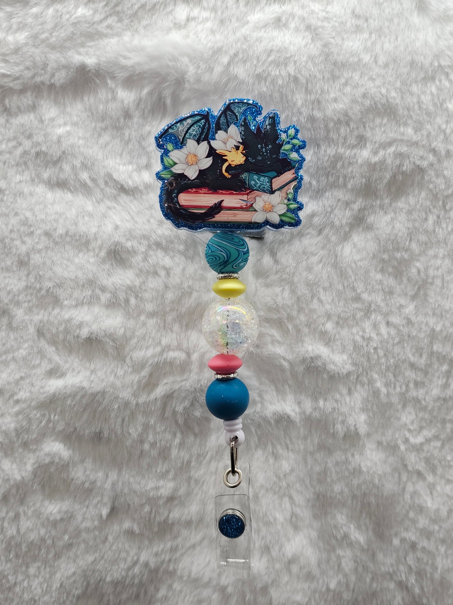 Sleepy Dragon on Books Badge Reel